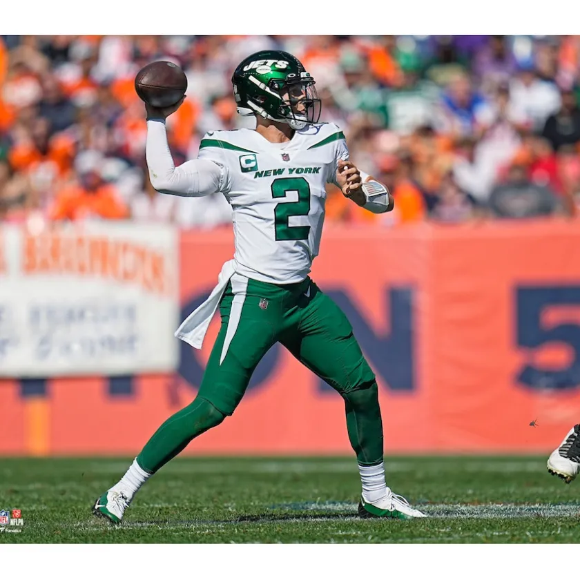 Photos|Prints & Artwork^New York Jets Zach Wilson Unsigned White Jersey Passing Photograph